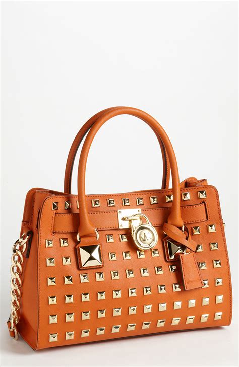 orange studded michael kors bag|Michael Kors orange totes.